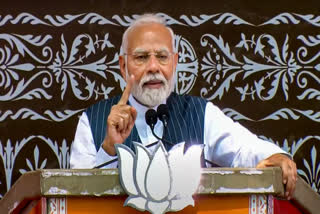 PM Narendra Modi is addressing a major rally in Jammu and Kashmir's Doda on Saturday, marking the first visit by a Prime Minister to the district in 42 years. The rally aims to boost BJP candidates ahead of September 18 Assembly elections. Multi-tier security has been deployed in Doda and Kishtwar for PM Modi's rally.