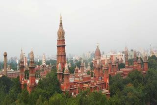 Former aiadmk minister selvaganapathy graveyard roof scam madras high court adjourn