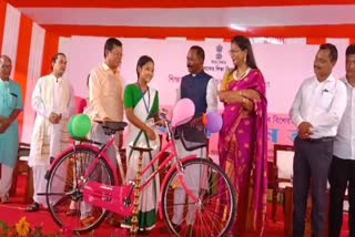 minister Sanjoy Kishan distributes bicycle among students in majuli