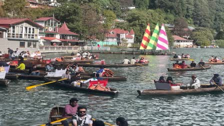 Tourists enjoying boating in Nainital