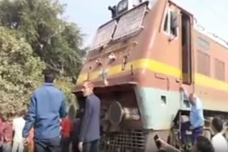 dead body hanging on engine and train was running in firozabad