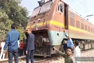 Young Man Body Hanging On Train Engine