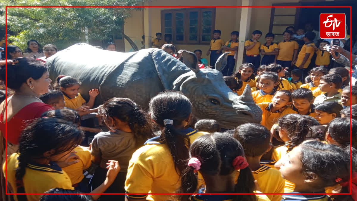 A symbol of a rhino among the students of a school in Jorhat