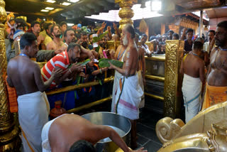 Devotees pay obeisance at Sabarimala Temple