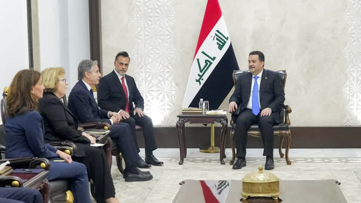 This handout picture released by Iraq's Prime Minister's Media Office shows PM Mohammed Shia al-Sudani meeting with US Secretary of State Antony Blinken in Baghdad on December 13, 2024.