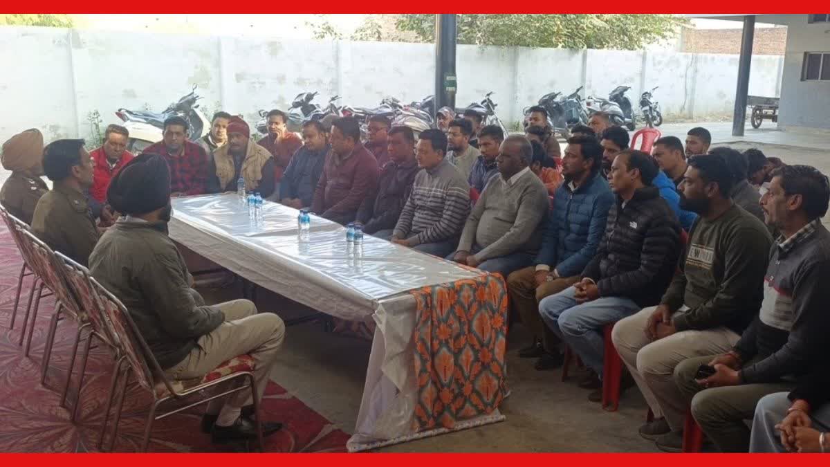 MEETING BETWEEN TRADERS AND POLICE