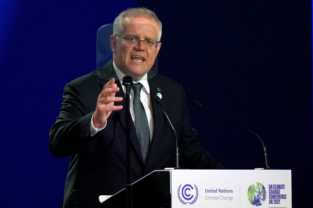 Australian Prime Minister Scott Morrison gestures as he makes a statement at the COP26 U.N. Climate Summit in Glasgow, Scotland,