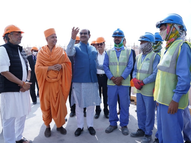 Om Birla talking to workers