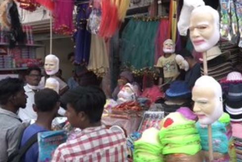 pm modi masks are in great demand for holi at in prayagraj market in up