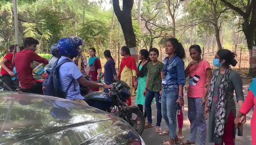 Students blocking vehicles