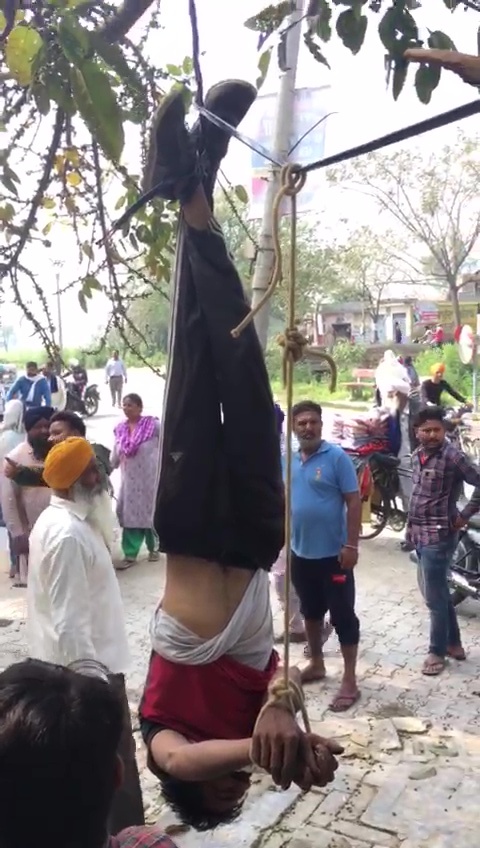 dalit boy hanged upside down: