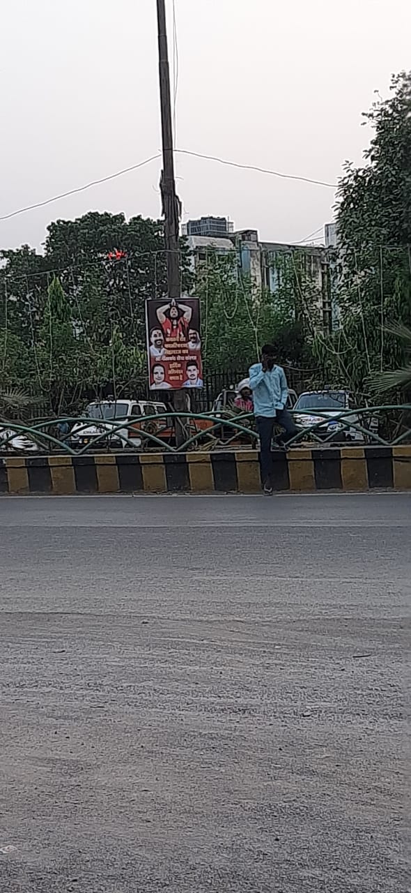 Supporters of Kalicharan put up banner posters