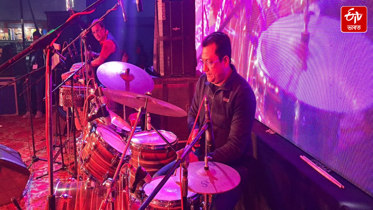 MLA Rupak Sharma as drummer at Nagaon Bhogali Mela