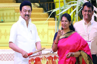 Tamil Nadu Chief Minister M K Stalin tries his hands on a drum during the inauguration ceremony of Chennai Sangamam Namma Ooru Tiruvizha 2025, in Chennai on Monday. DMK MP Kanimozhi Karunanidhi also seen.