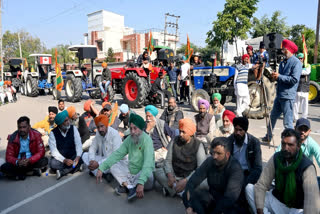 Samyukt Kisan Morcha (SKM) supporters hold a 'Tractor Parade' over various demands outside the residence of BJP party leaders, in Patiala.