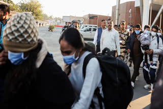 Indian immigrants who allegedly illegally migrated to US arrive at Sardar Vallabhbhai Patel International Airport, in Ahmedabad