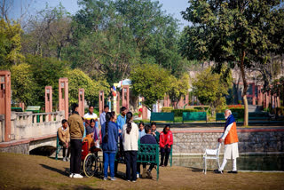 Prime Minister Narendra Modi distribute sweets to students during 'Pariksha Pe Charcha' programme, at Sunder Nursery, in New Delhi.