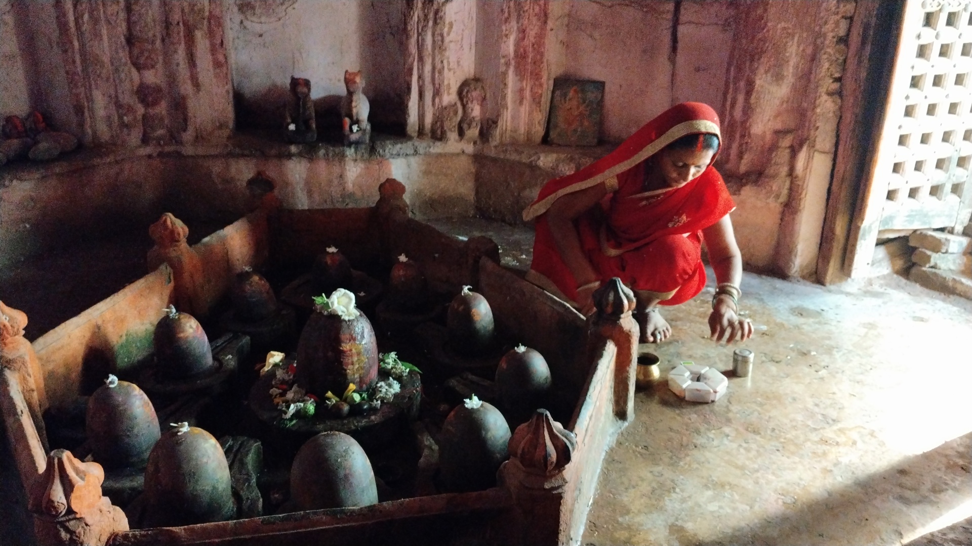 Woman praying inside Congress temple in Bihar