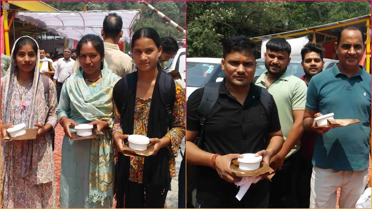 Devotees taking Malpua Prasad at Kainchi Dham