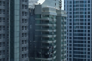 This picture shows the damage after a fire broke out in a building in Dubai's Yas Marina on June 14, 2025.