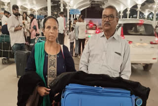 िRanjanben and Pravinbhai Patel at the Ahmedabad International Airport.
