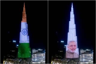 Burj Khalifa Lit up as Prime Minister Modi  Prime Minister Modi visits UAE  Burj Khalifa  ಯುಎಇಯಲ್ಲಿ ಮೋದಿಗೆ ಆತ್ಮೀಯ ಸ್ವಾಗತ  ಬುರ್ಜ್ ಖಲೀಫಾದಲ್ಲಿ ಕಂಗೊಳಿಸಿದ ತ್ರಿವರ್ಣ ಧ್ವಜ  ಭಾರತದ ತ್ರಿವರ್ಣ ಧ್ವಜ  ವಿಶ್ವದ ಅತಿ ಎತ್ತರದ ಕಟ್ಟಡವಾದ ಬುರ್ಜ್ ಖಲೀಫಾ  ಬುರ್ಜ್ ಖಲೀಫಾದಲ್ಲಿ ಪ್ರಧಾನಿ ನರೇಂದ್ರ ಮೋದಿಯವರ ಚಿತ್ರ  ರಾಷ್ಟ್ರಧ್ವಜವನ್ನು ಪ್ರದರ್ಶಿಸಿ ಪ್ರಧಾನಿಯನ್ನು ಆಹ್ವಾನ