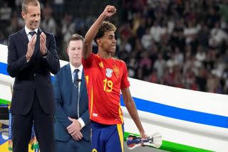 Spain's Lamine Yamal smiles after winning the final match between Spain and England at the Euro 2024 soccer tournament in Berlin, Germany, Sunday, July 14, 2024.