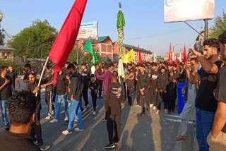 Mourners Wave Palestinian Flags