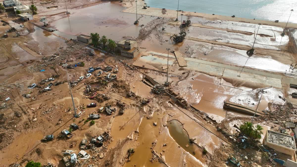 Libyan city closed off as searchers look for 10100 missing after flood deaths rise to 11300
