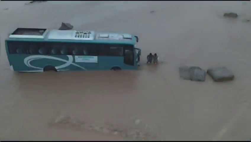 Bus stuck in river