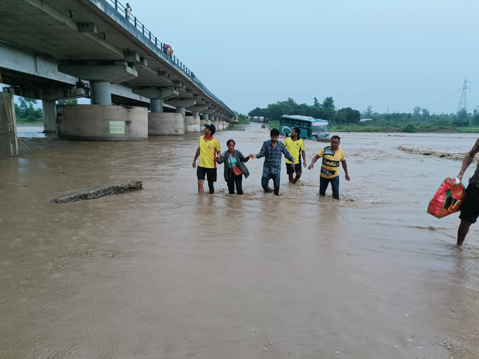 Bus stuck in river