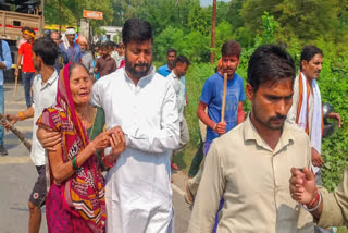 Relatives of the 22-year-old Ram Gopal Mishra killed in communal violence on Sunday attend his funeral procession, in Bahraich