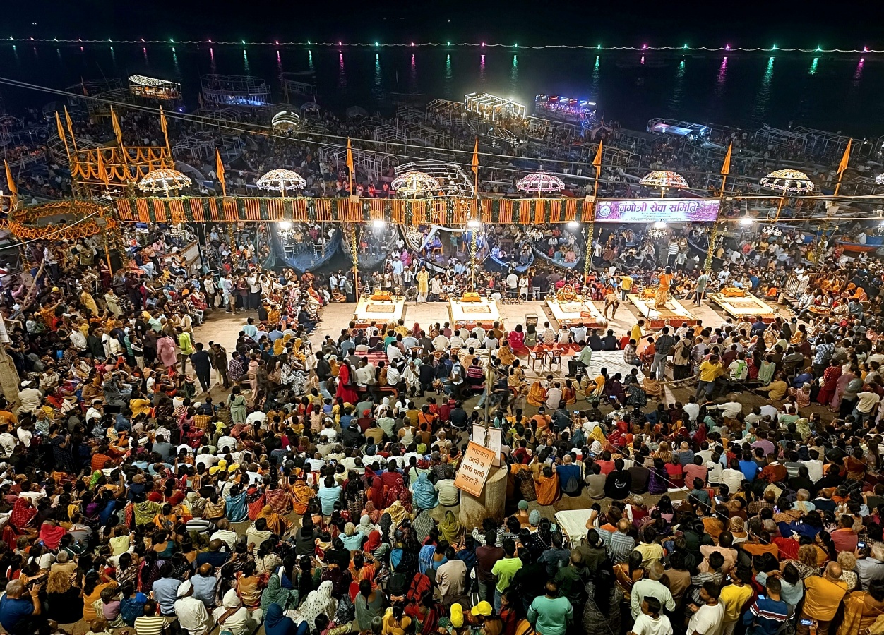 Varanasi gears up for dev Deepwali on Kartik Purnima, featuring 17 lakh diyas, Ganga Aarti, and multimedia shows, with heightened security and crowd management.