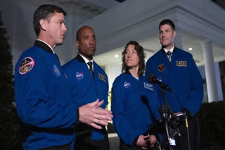 US President Biden hosts NASA's first crew of astronauts assigned to fly around the moon in a half-century
