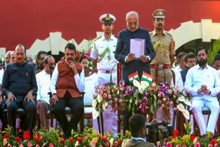 Maharashtra Governor CP Radhakrishnan, Chief Minister Devendra Fadnavis, Deputy Chief Ministers Ajit Pawar and Eknath Shinde and others during the swearing-in ceremony of cabinet ministers amid state cabinet expansion, at Raj Bhavan, in Nagpur, Sunday, Dec. 15, 2024. The 10-day-old BJP-led Mahayuti alliance ministry in Maharashtra was expanded at Nagpur on Sunday, with 39 ministers being sworn in, taking its strength to 42.