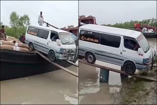 Two planks were attached to the boat and the van was taken across