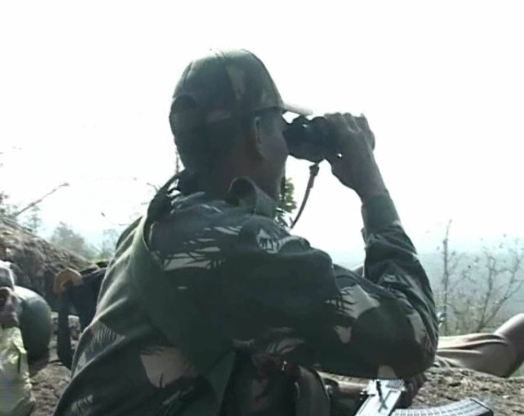 Security forces personnel stand guard in Chaibasa, Jharkhand