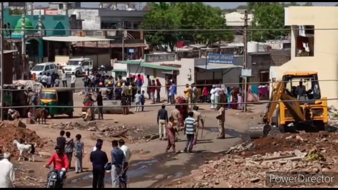demolition drive begins in riot-hit Himmatnagar using Bulldozers