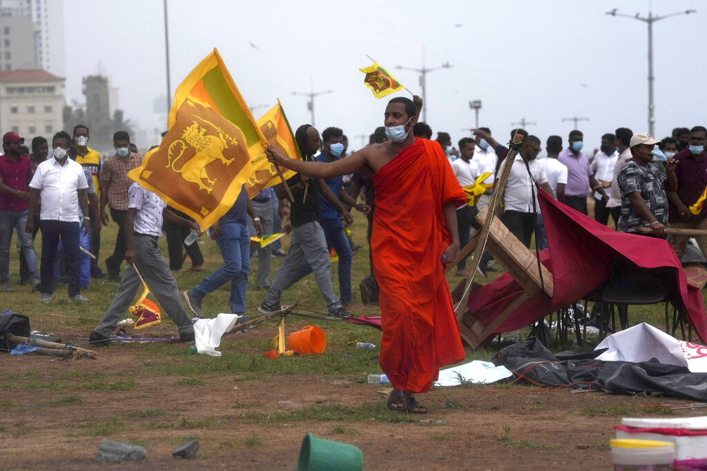 In Sri Lanka Violence crowd gathers outside naval base housing ex-PM Rajapaksa