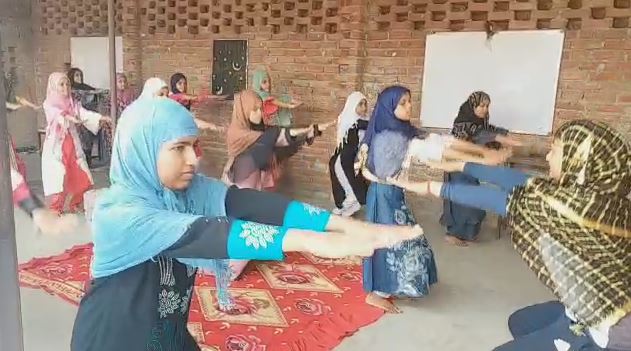 Muslim Girls Taking Training in Hijab