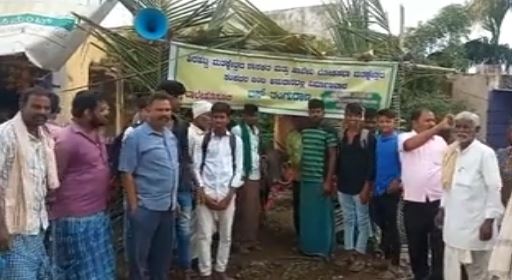 Villagers are inaugurated the busstop with a buffalo