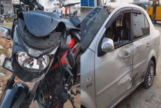 two wheeler hitting a car