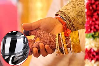 bride groom getting helmets gift in Bilaspur