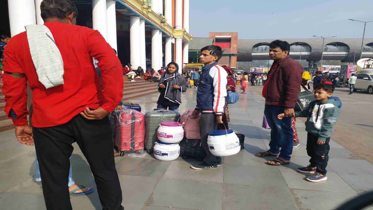 Passengers at the New Delhi Station.