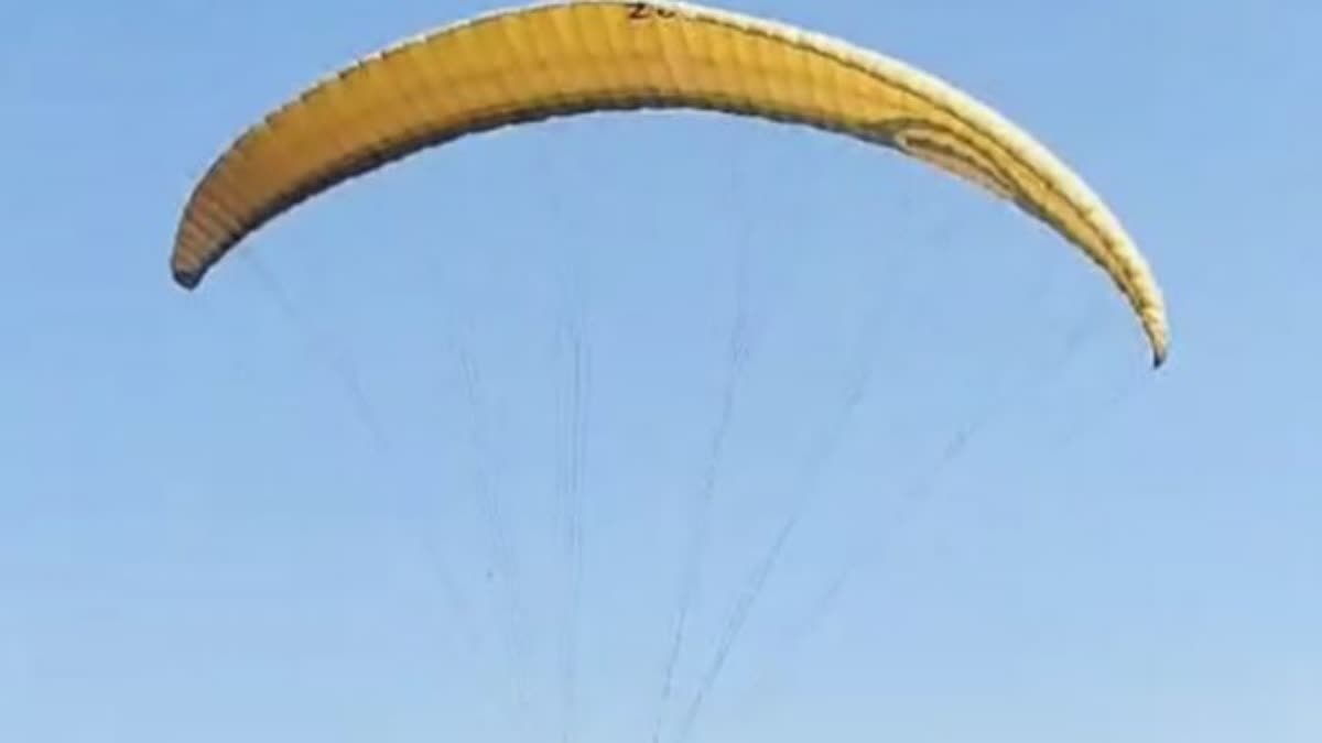 The student reached the exam center by paragliding