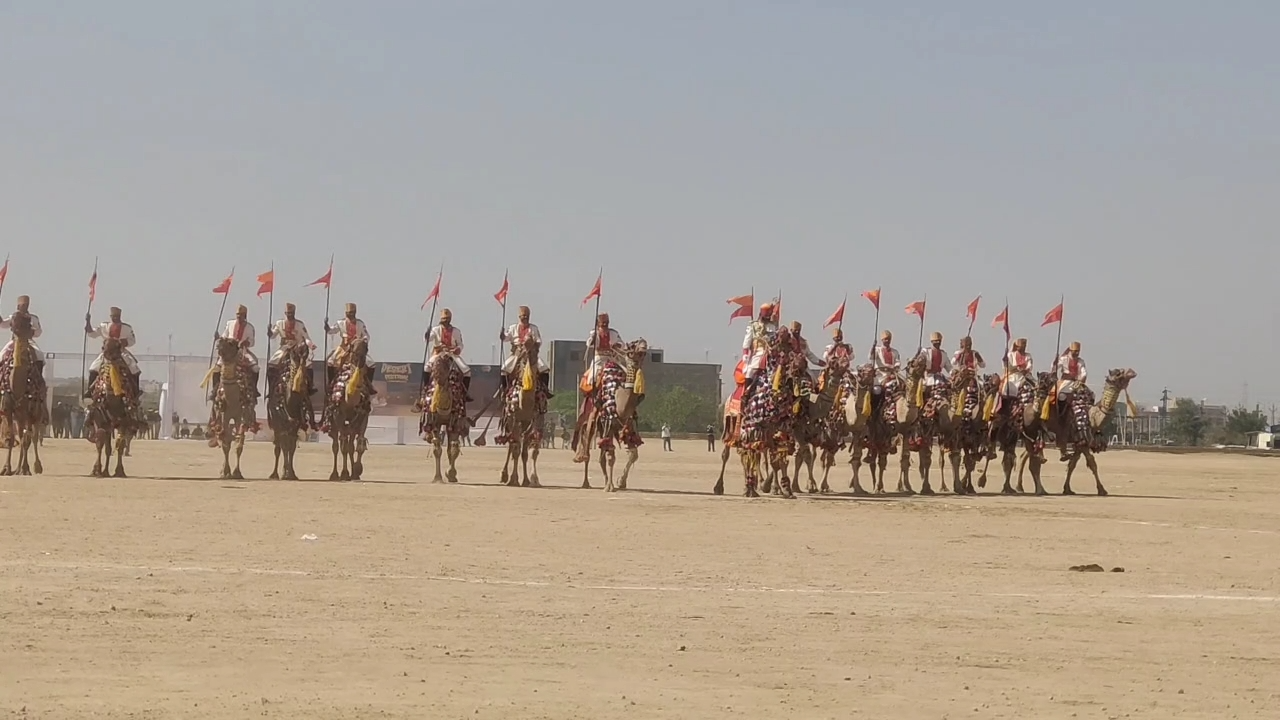 Personnel of Border Security Force (BSF) patrol on camels on the Rajasthan border to keep the borders safe