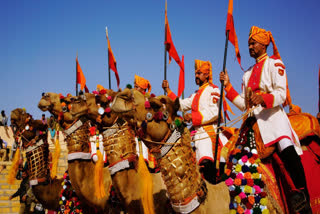 Personnel of Border Security Force (BSF) patrol on camels on the Rajasthan border to keep the borders safe