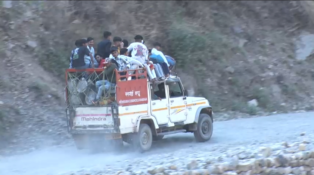 PEOPLE TRAVELING ON VEHICLE