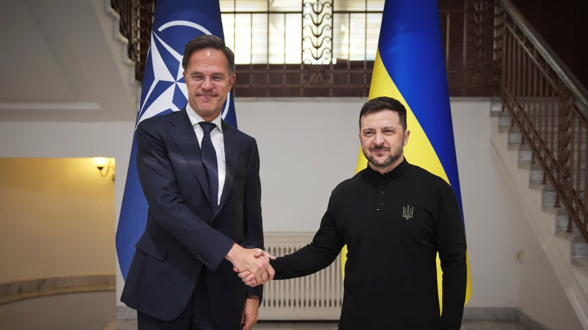 In this photo provided by the Ukrainian Presidential Press Office, NATO Secretary General Mark Rutte and Ukraine's President Volodymyr Zelenskyy, right, pose for a photo during their meeting in Odesa, Ukraine, Tuesday, April 15, 2025.