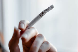 A probe has been ordered against a doctor after he was allegedly seen telling a boy to smoke a cigarette to cure a cold.